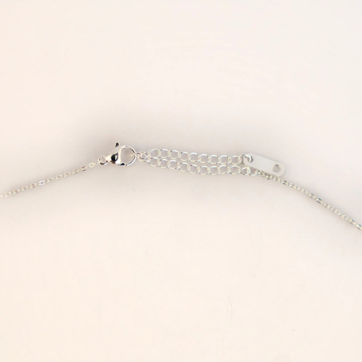 Cierre mosquetón y extensor de la cadena rolo de acero plateado