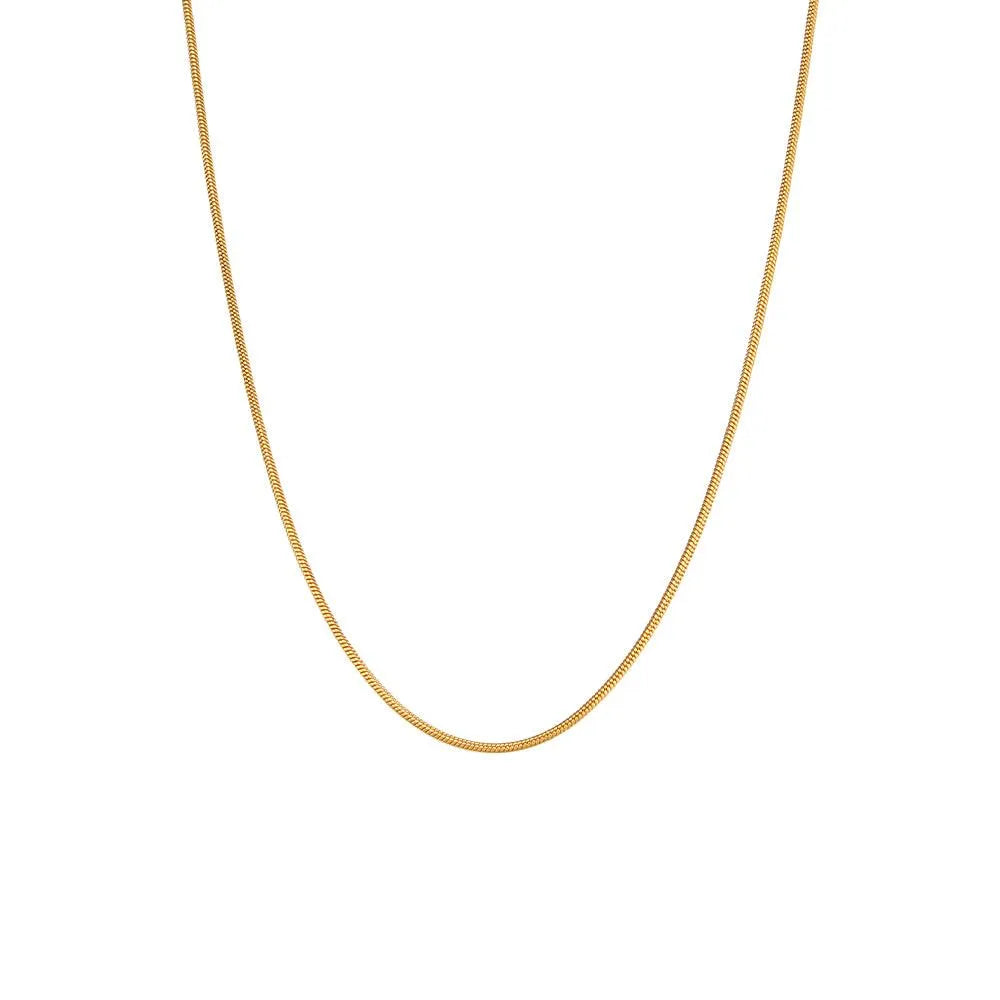 Collar Omega en acero inoxidable color oro, diseño rígido y elegante para diario