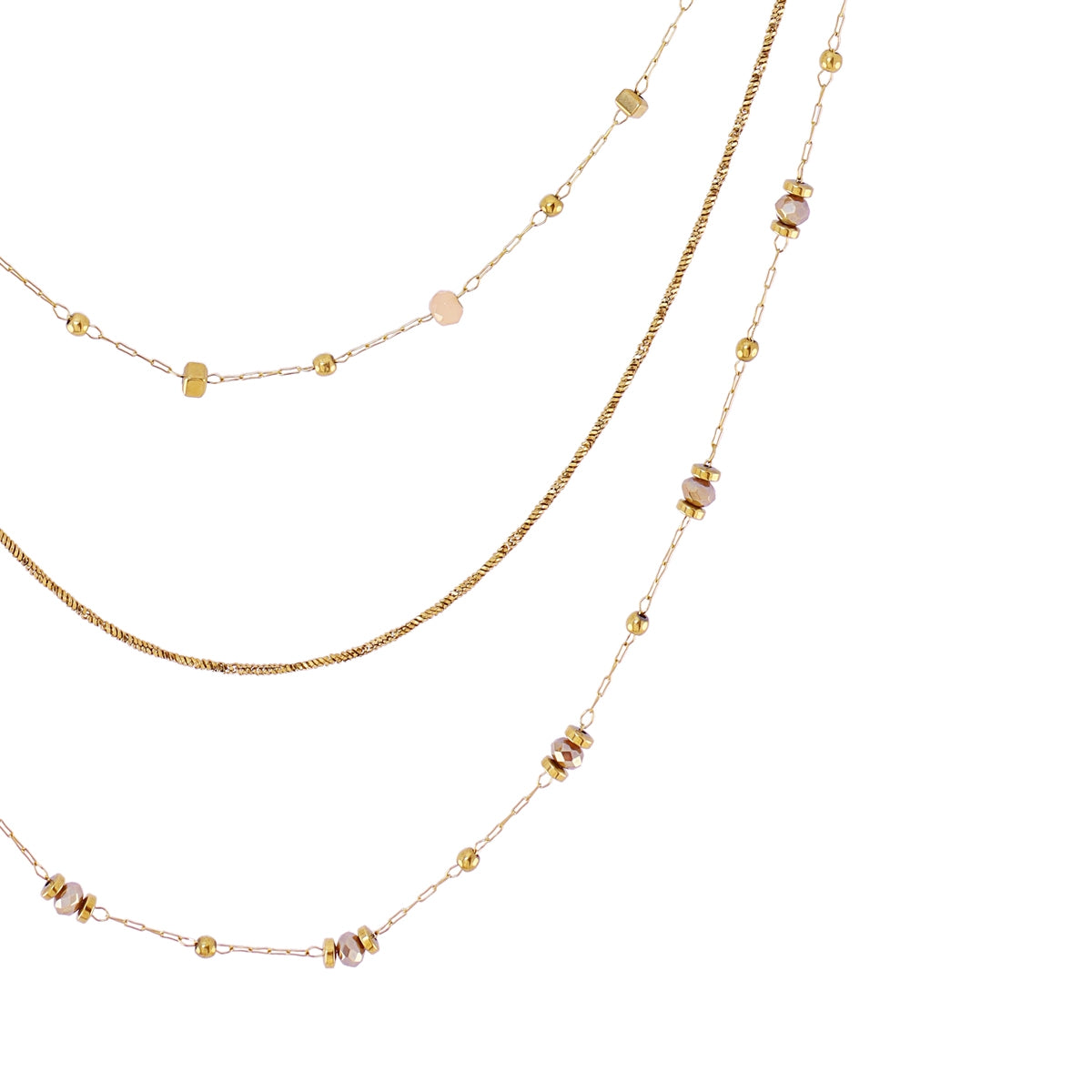 Detalle del collar Spirit Allay dorado con piedras de cristal en tonos suaves beige