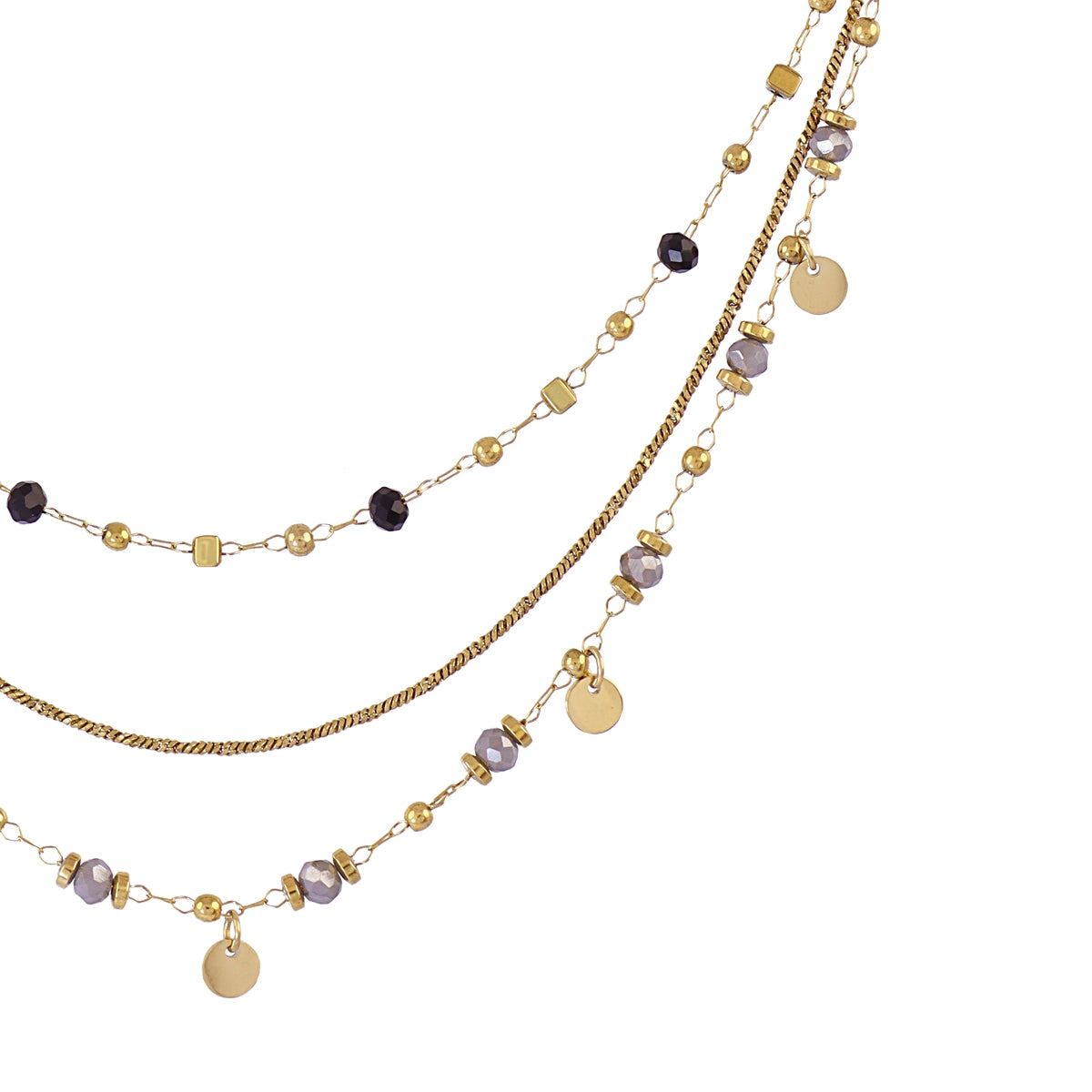 Detalle del collar Spirit Vilo dorado con cuentas y cristales en tonos neutros