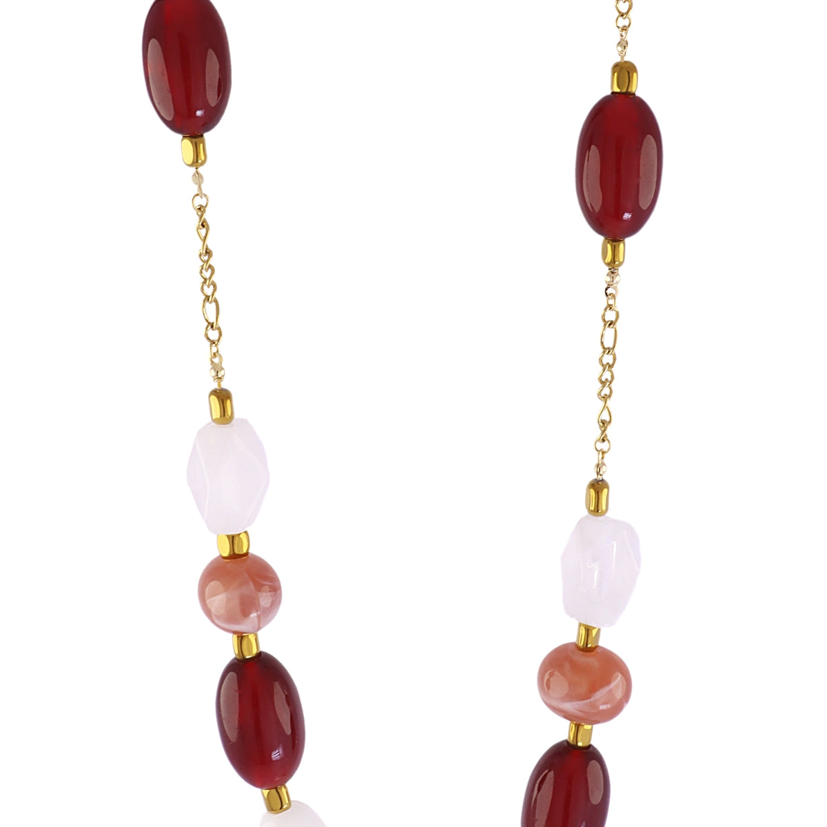 Detalle del Collar Marbles Elva con cuentas de resina ovaladas y brillo translúcido en acero dorado – Cobalto Accesorios