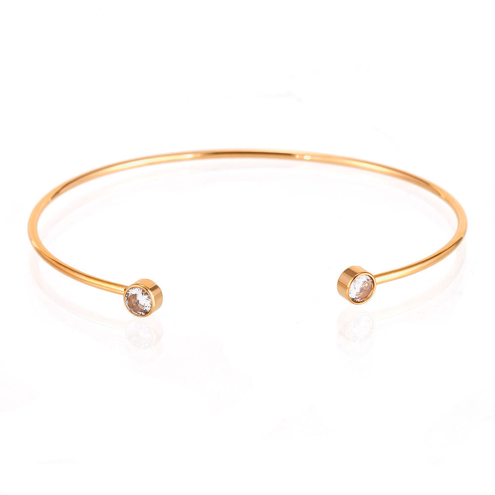 Pulsera Doble Luz tipo esclava con circonitas de 5 mm en acero 316L acabado oro