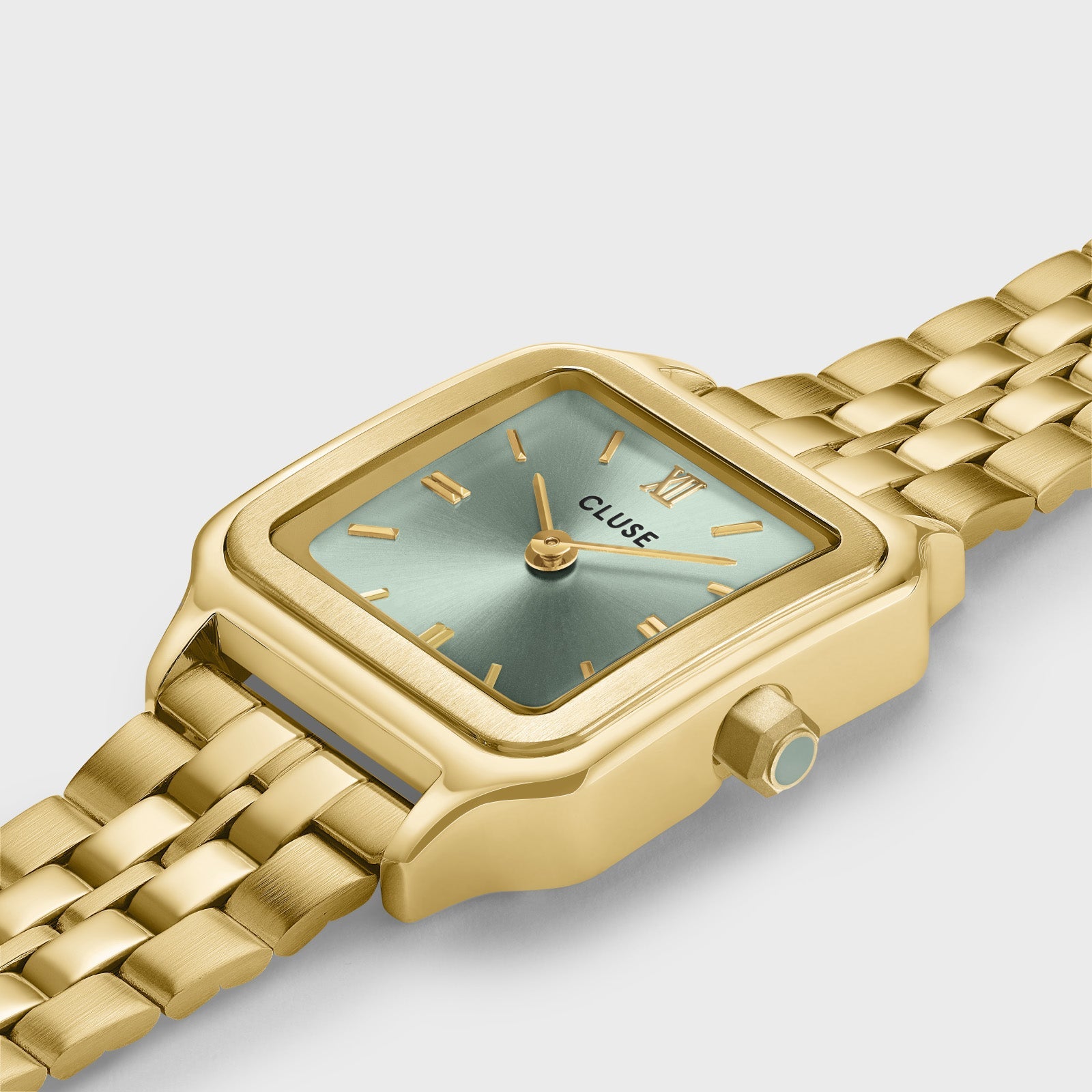 Detalle del reloj Cluse Gracieuse Petite verde salvia y dorado