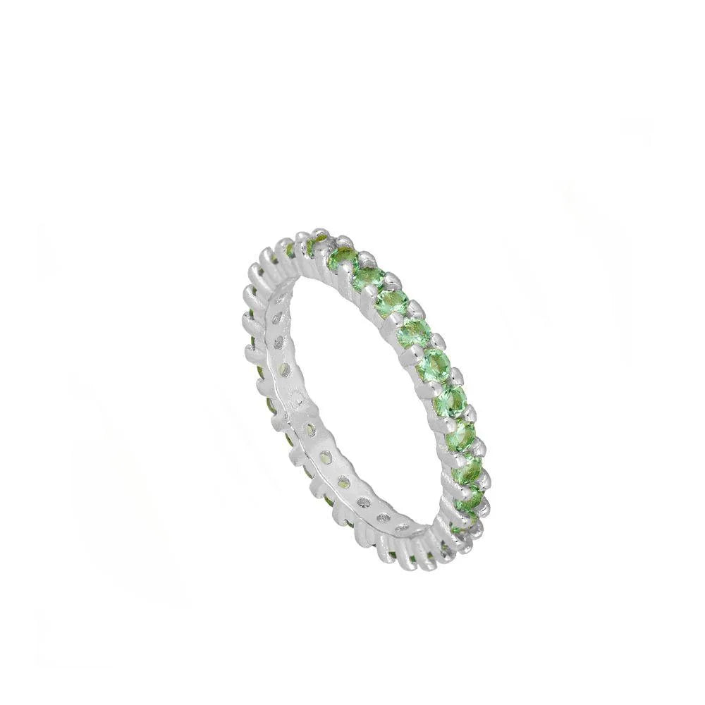 Vista adicional del anillo con circonitas de colores, diseño elegante y brillante