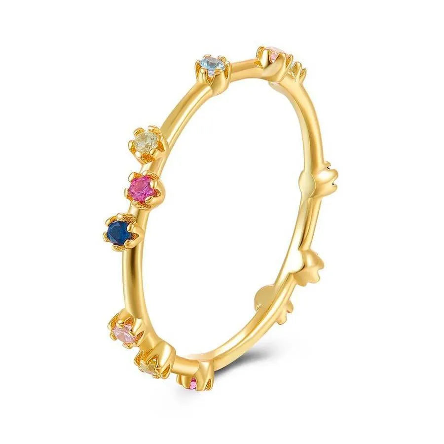 Anillo con circonitas multicolor separadas, diseño brillante y alegre