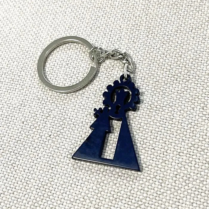 Llavero de la Virgen de los Desamparados azul marino en acetato de celulosa