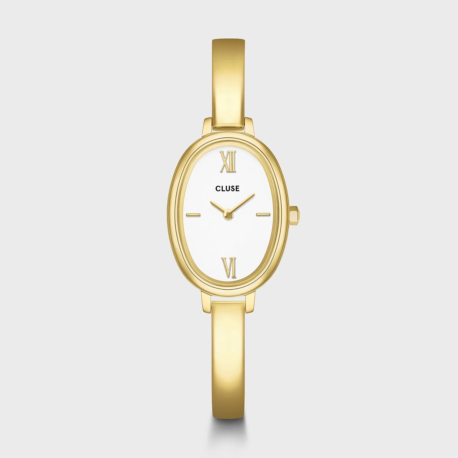 Reloj Cluse L'Ovale con caja ovalada dorada y esfera blanca, visto de frente sobre fondo gris