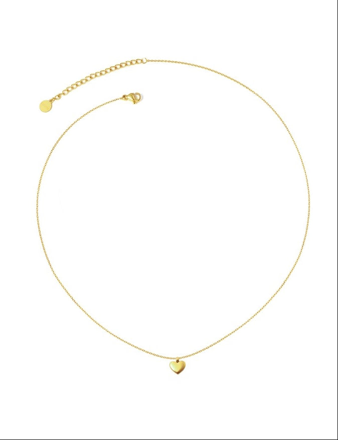 Collar Corazón Mini dorado en fondo neutro, cadena ajustable y colgante corazón