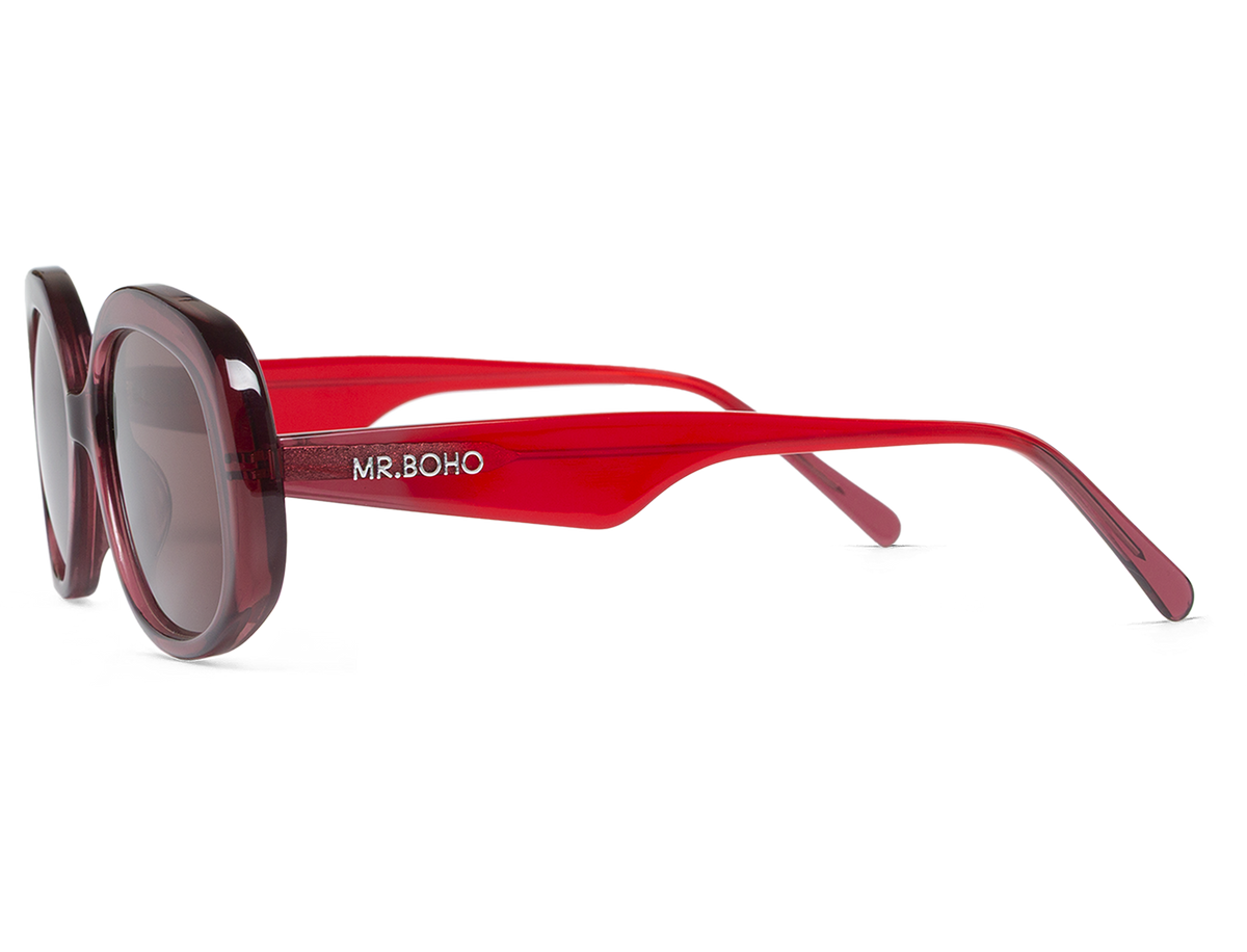 Gafas de sol Mr. Boho BORGER 43Degrees en vista lateral, montura rosa burdeos translúcida