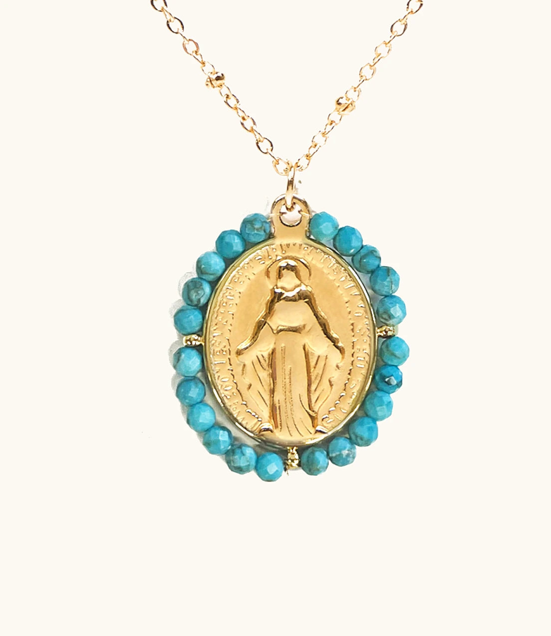 Detalle collar Virgen Milagrosa con turquesa natural