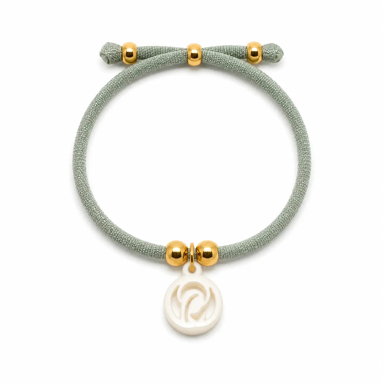 Pulsera Virgen Niña con cordón elástico verde agua y medalla de la Virgen, pieza fina para niña