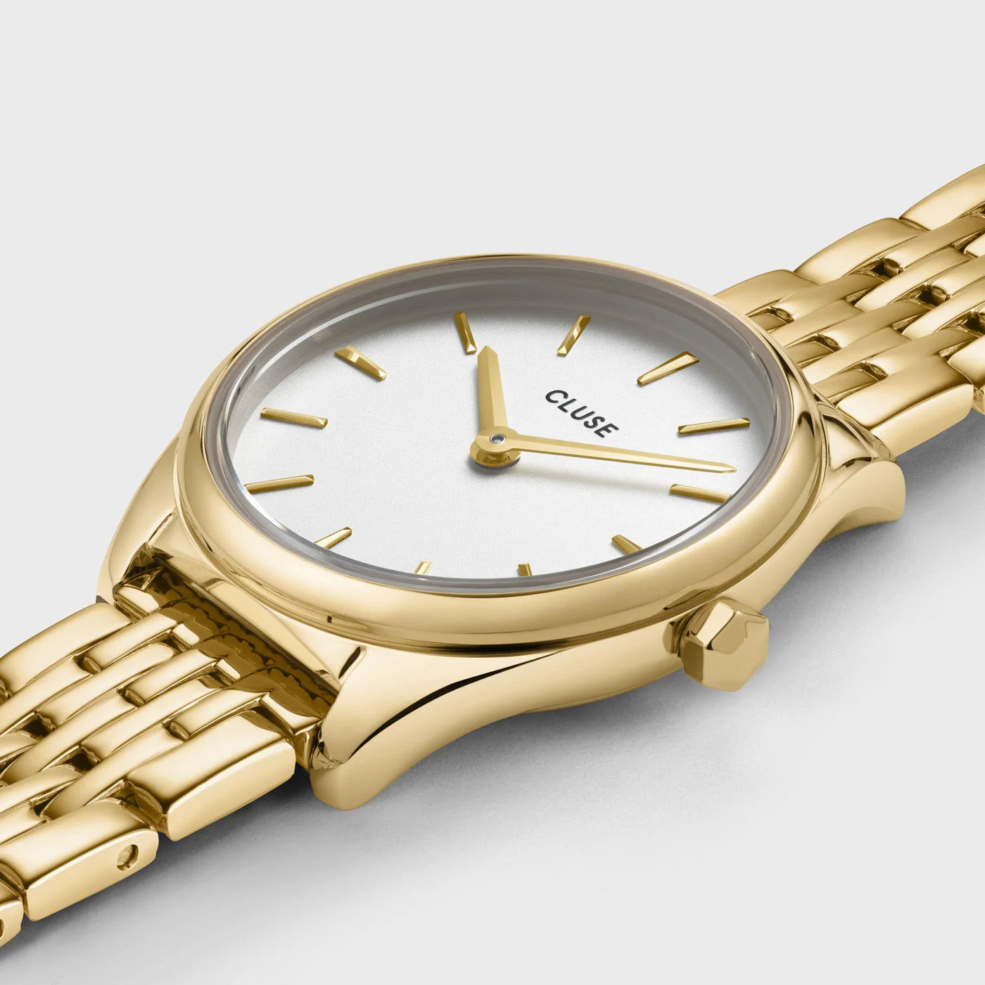 Detalle de la esfera blanca y caja dorada del reloj Cluse Féroce Mini White Gold
