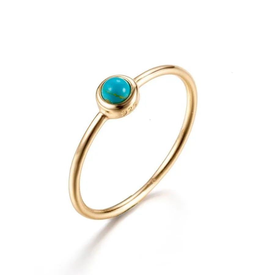 Anillo con turquesa en plata de ley 925, diseño protagonista con piedra azul verdosa
