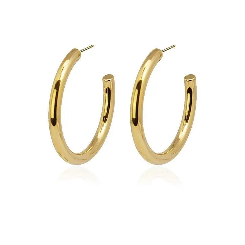 Aros de acero anchos de 40 mm, diseño llamativo y versátil para diario