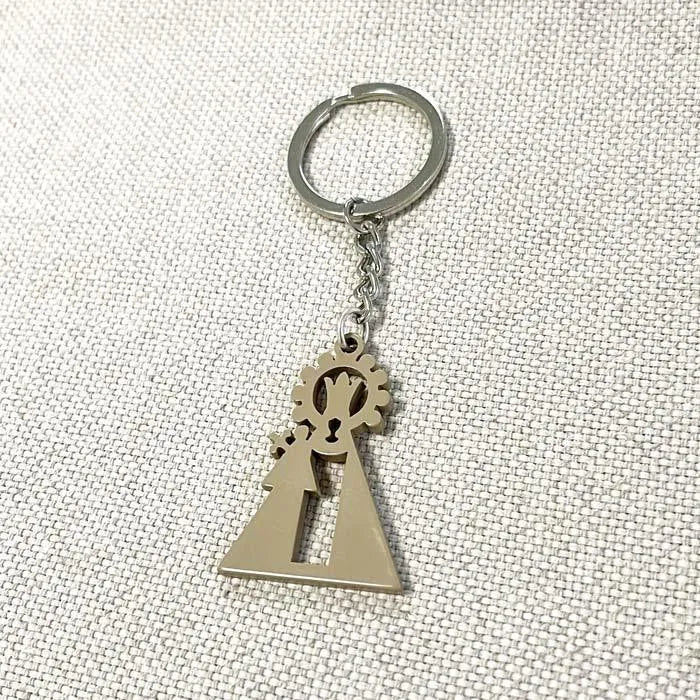 Llavero de la Virgen de los Desamparado en acetato de celulosa de color piedra