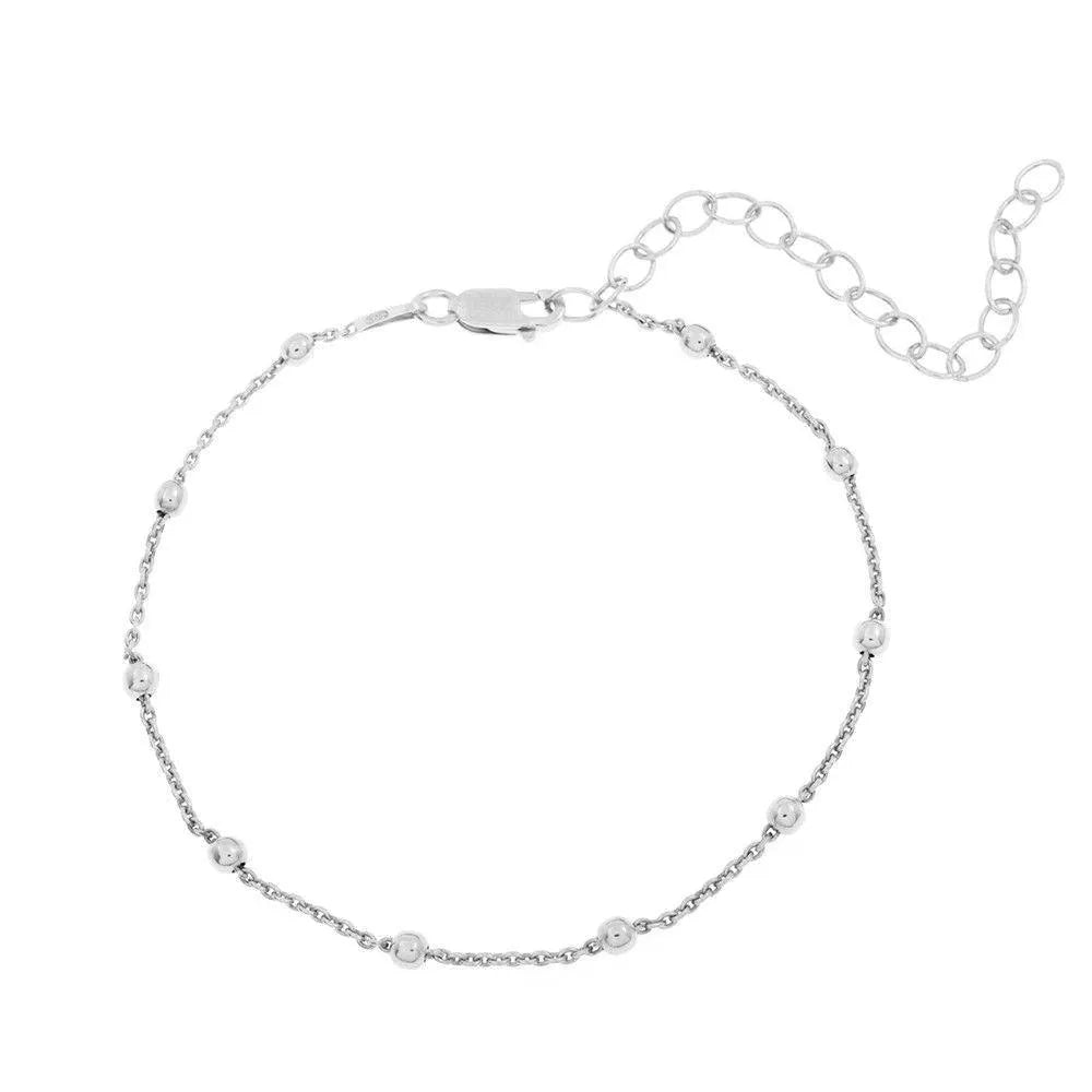 Detalle de la pulsera de bolas en plata 925, pieza fina para llevar sola o combinada